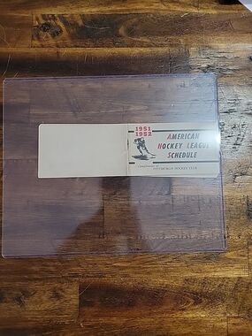 1951-52 AHL American Hockey League pocket schedule booklet some scores posted